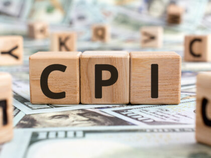 CPI acronym from wooden blocks with letters, abbreviation CPI Consumer price index concept, random letters around, money background